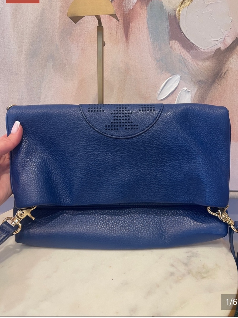 Tory Burch Blue Pebbled
Blue Leather Fold-Over Crossbody bag